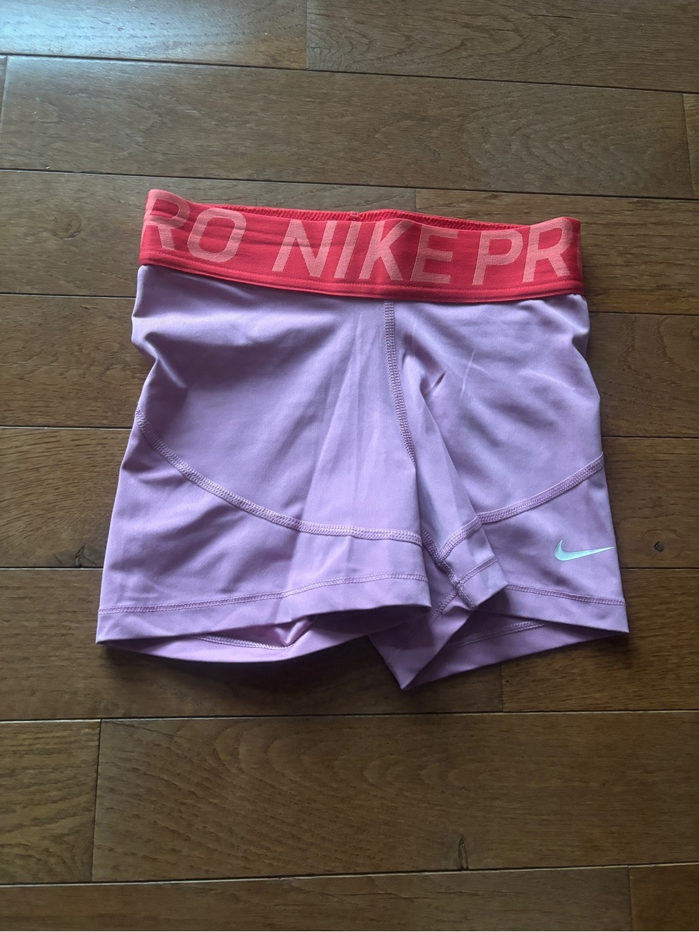 Nike Pro Women’s Pink Training Shorts with Coral Branded Waistband